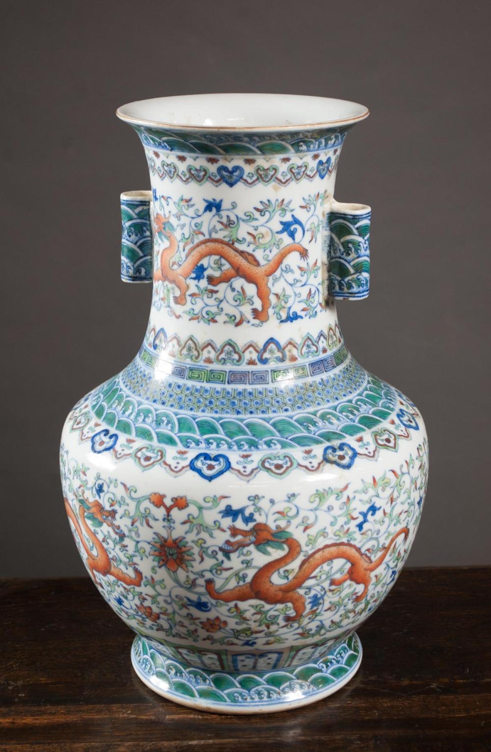 Appraisal: CHINESE DOUCAI DRAGON PORCELAIN VASE attributed Qing Dynasty - of