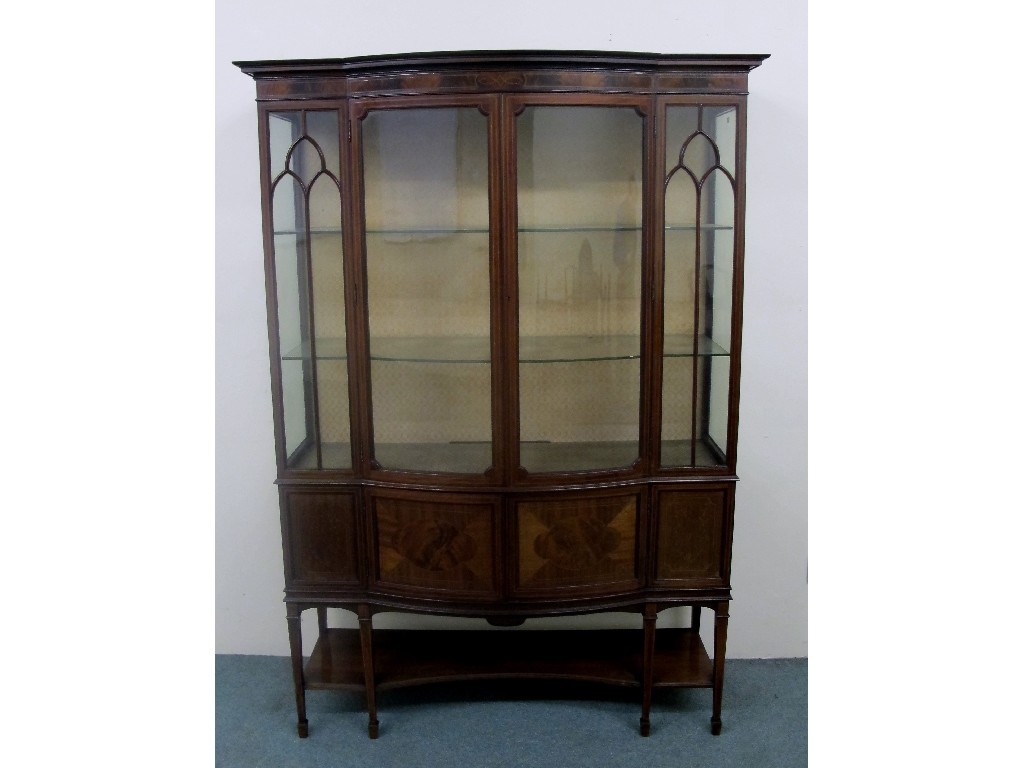 Appraisal: An Edwardian mahogany inlaid display cabinet with two glazed doors