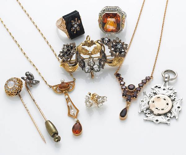 Appraisal: A collection of nine gem-set jewelry items including one brooch