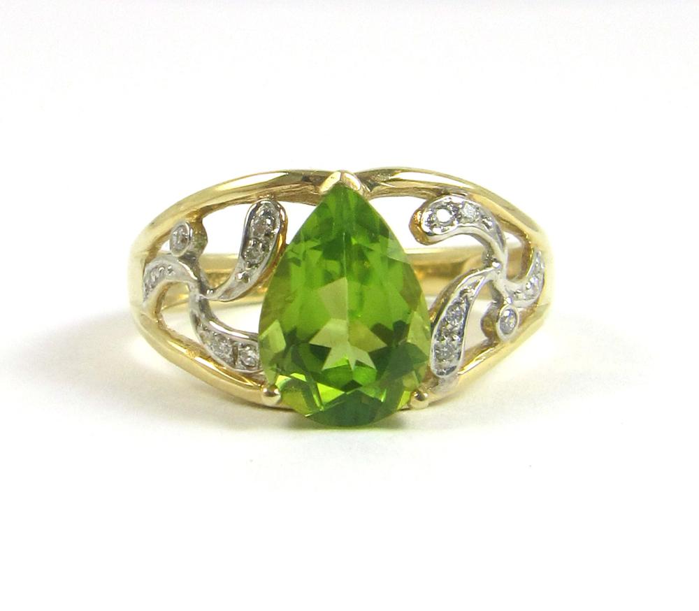 Appraisal: PERIDOT DIAMOND AND FOURTEEN KARAT GOLD RING The k yellow