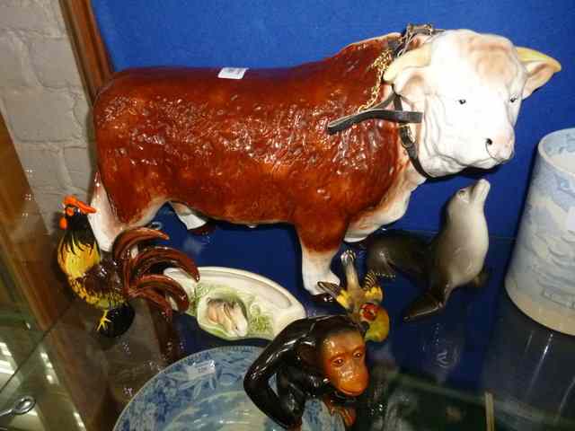 Appraisal: A MELBA WARE FIGURE of a bull together with J