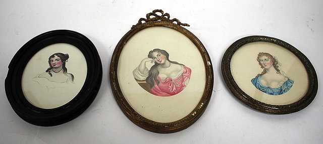 Appraisal: A WATERCOLOUR PORTRAIT MINIATURE OF A LADY with a pearl