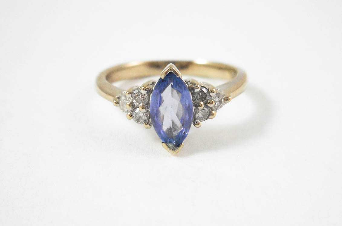 Appraisal: TANZANITE DIAMOND AND FOURTEEN KARAT GOLD RING The white gold