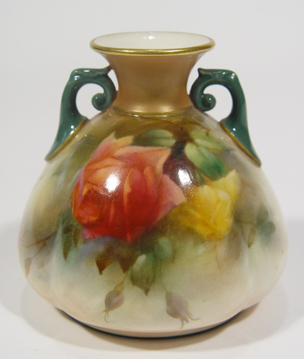 Appraisal: Royal Worcester two handled vase hand painted with roses to