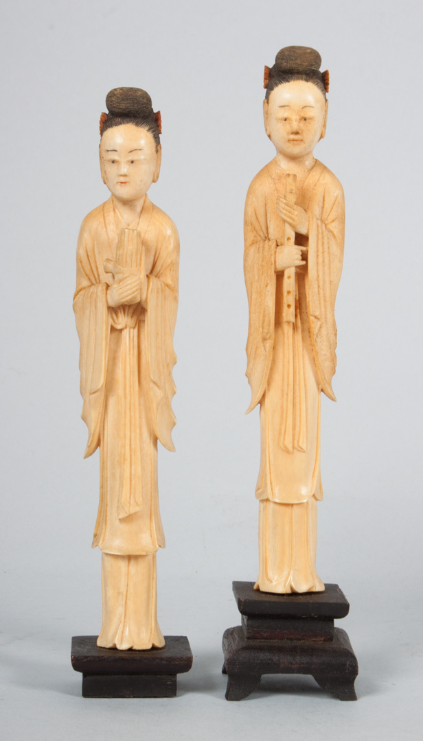 Appraisal: Two Japanese carved ivory courtesans each modeled as female figure