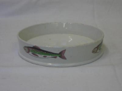 Appraisal: AN ENGLISH POTTERY CHAR DISH of circular form the sides