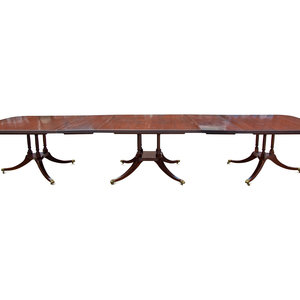 Appraisal: A Regency Style Walnut Dining Table th Century together with