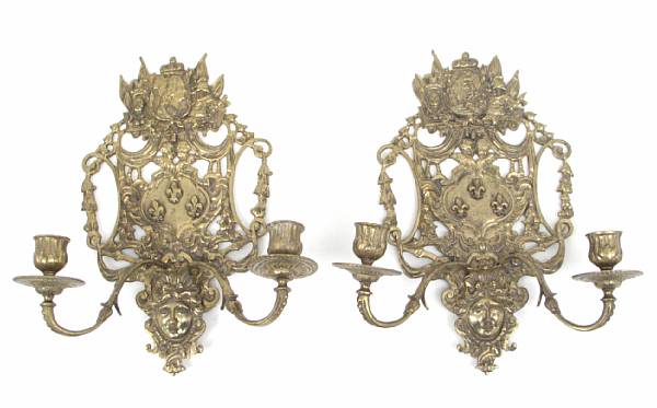 Appraisal: A pair of brass two light wall sconces height in