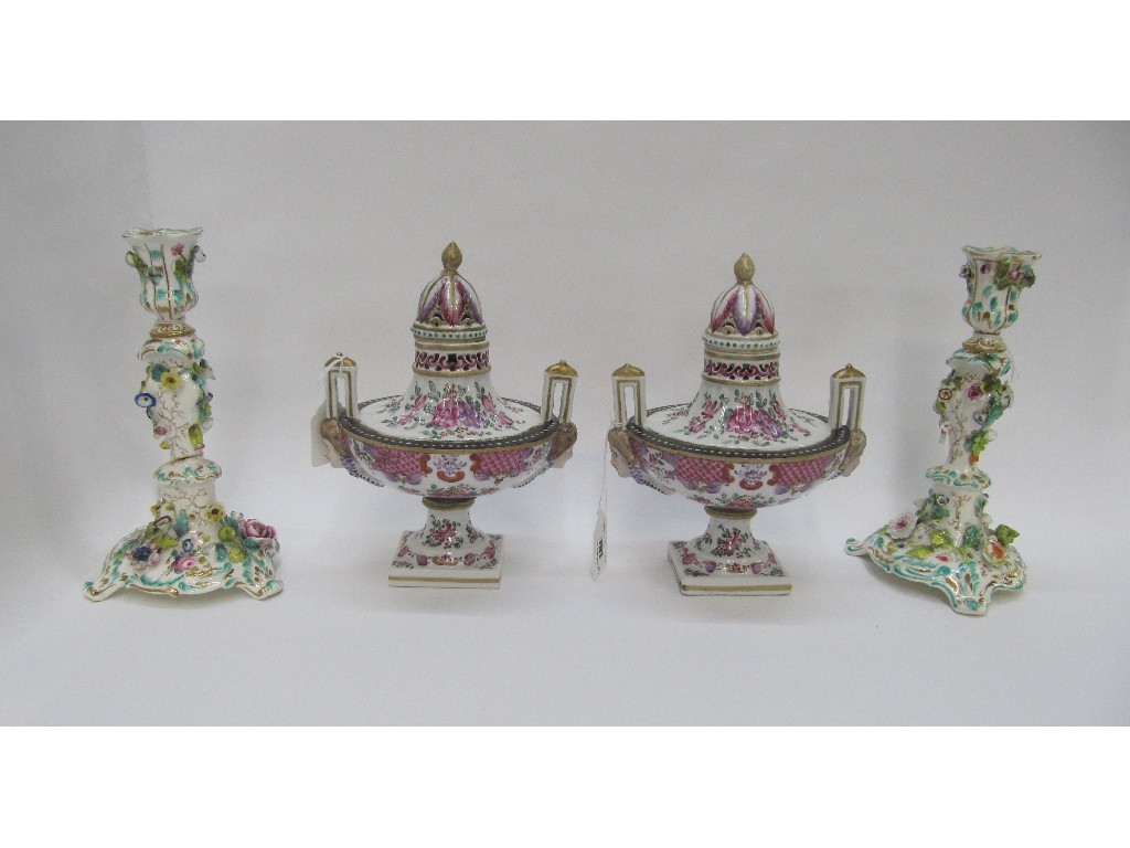 Appraisal: Pair of English porcelain pot pourri urns and covers with