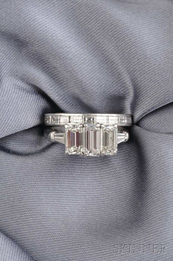 Appraisal: Platinum and Diamond Three-stone Ring prong-set with three emerald-cut diamonds