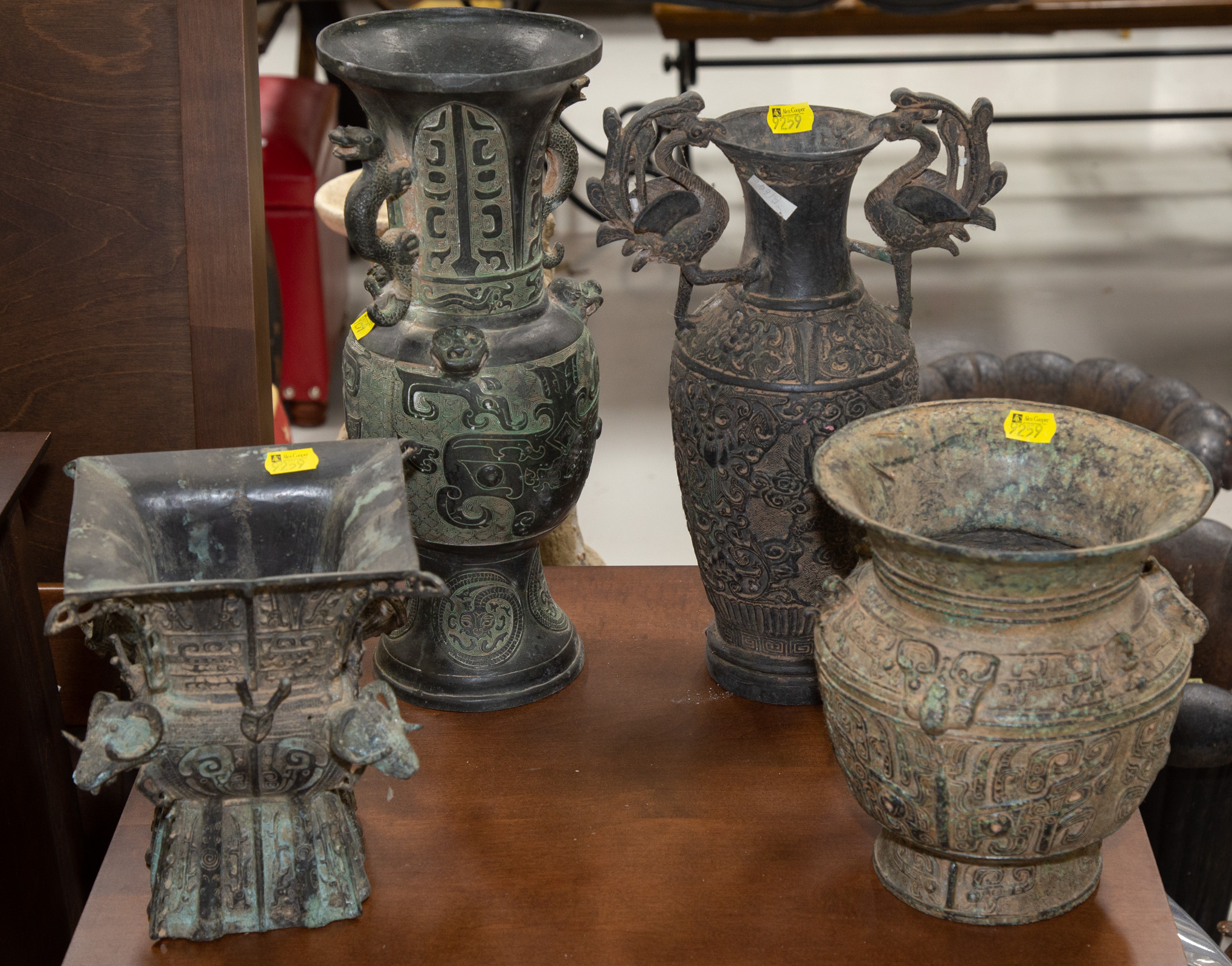 Appraisal: FOUR CHINESE ARCHAIC STYLE BRONZE VASES th century