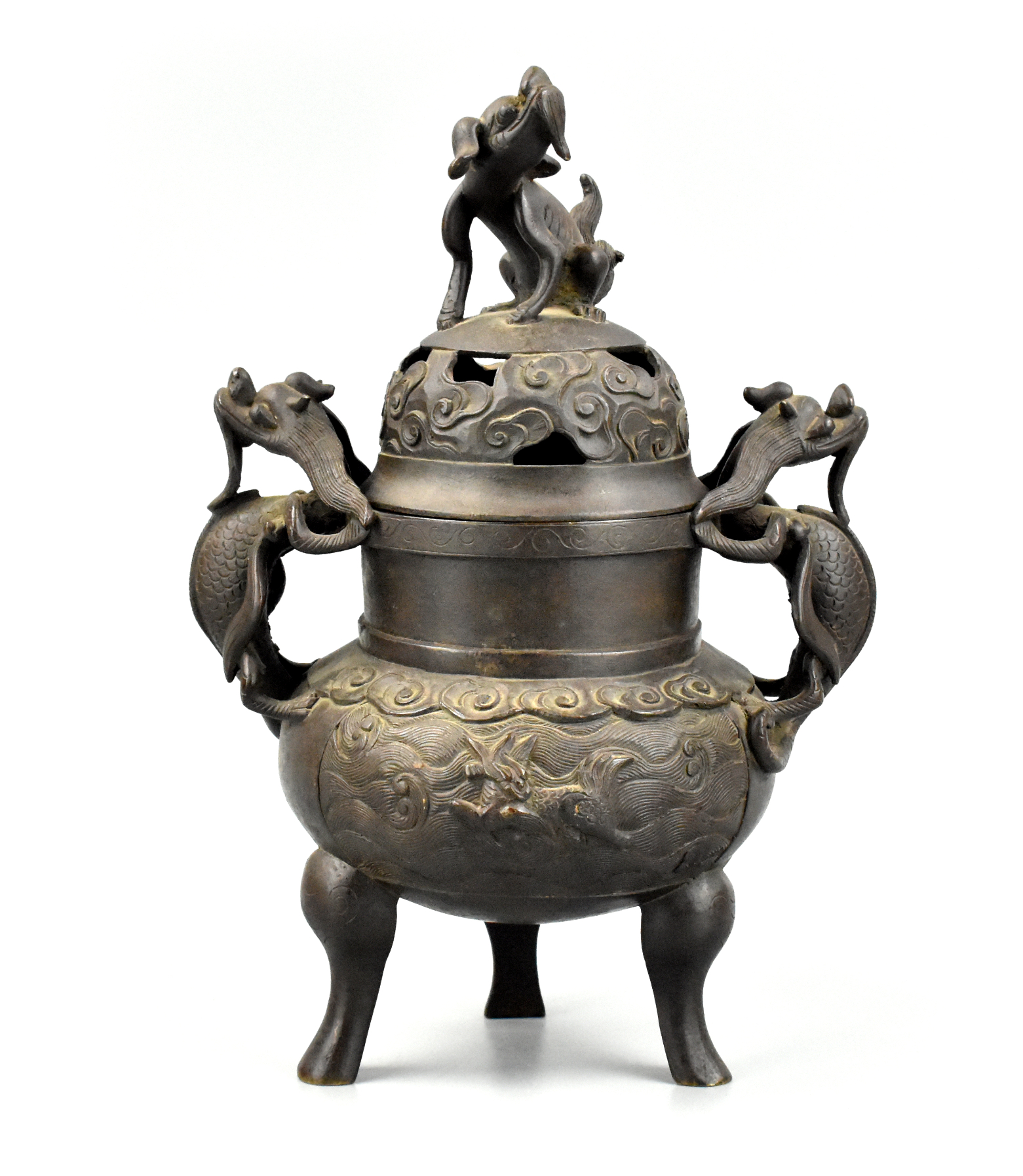 Appraisal: A Chinese bronze tripod censer with a kirin finial on