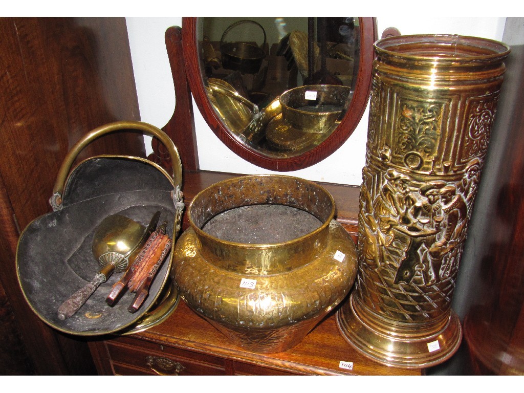 Appraisal: Brass stick stand jardinere and coal helmet