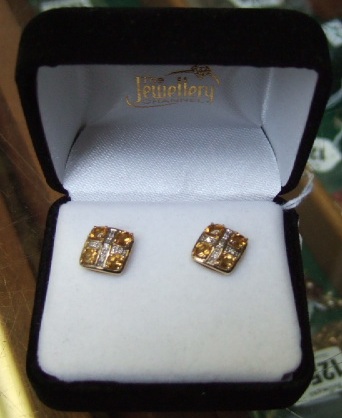 Appraisal: A pair of ct gold citrine and diamond earrings 's