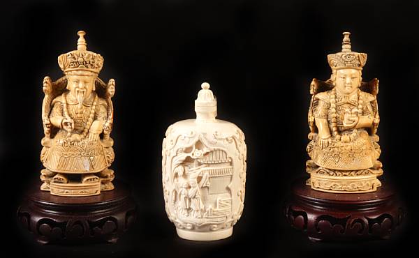 Appraisal: A group of three small carved ivory decorations China th