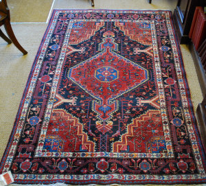 Appraisal: A contemporary Persian Hamadan rug the centre medallion design on