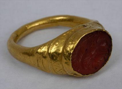 Appraisal: EARLY PERSIAN AGATE INTAGLIO SET IN A GOLD RING Size