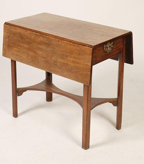 Appraisal: A GEORGE III MAHOGANY PEMBROKE TABLE with a rectangular top