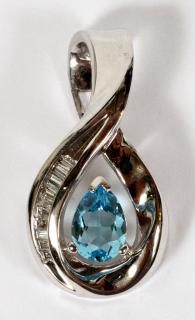 Appraisal: DIAMOND AND TOPAZ PENDANT KT DIAMOND AND TOPAZ PENDANT KT