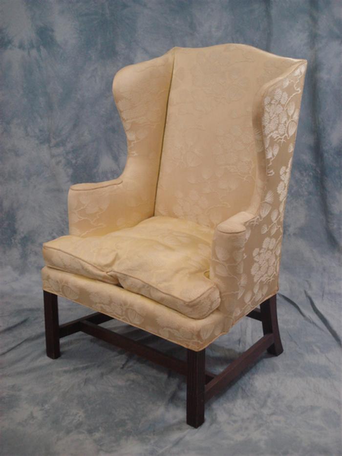 Appraisal: Kittinger mahogany Chippendale style wing chair stop fluted front legs