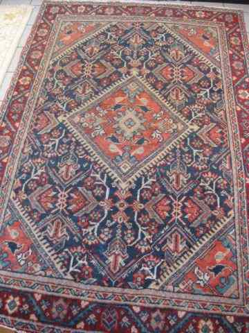 Appraisal: Mahal Persian Handmade Rug overall geometrics of florals primarily reds