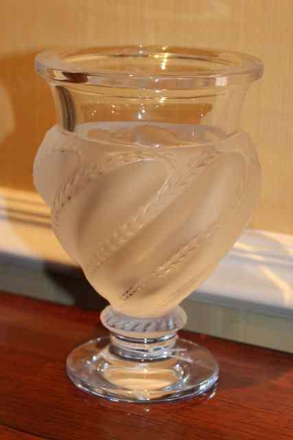 Appraisal: A CONTEMPORARY LALIQUE VASE with flaring rim and wrythen decoration