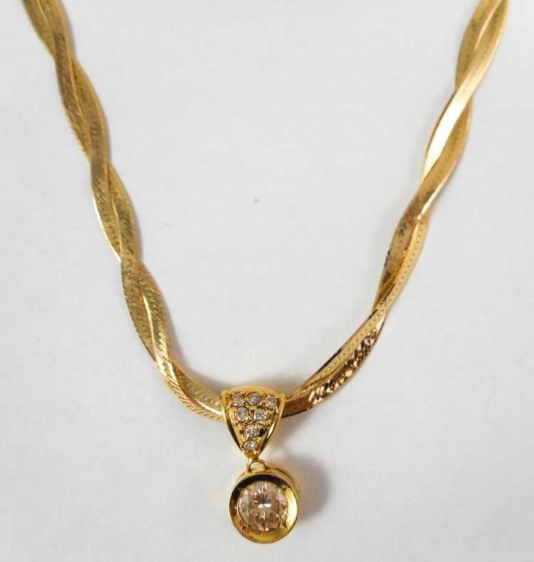 Appraisal: DIAMOND AND YELLOW GOLD PENDANT NECKLACE suspended on a -