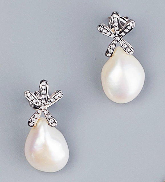 Appraisal: A PAIR OF FRESHWATER PEARL AND DIAMOND EARRINGS each baroque