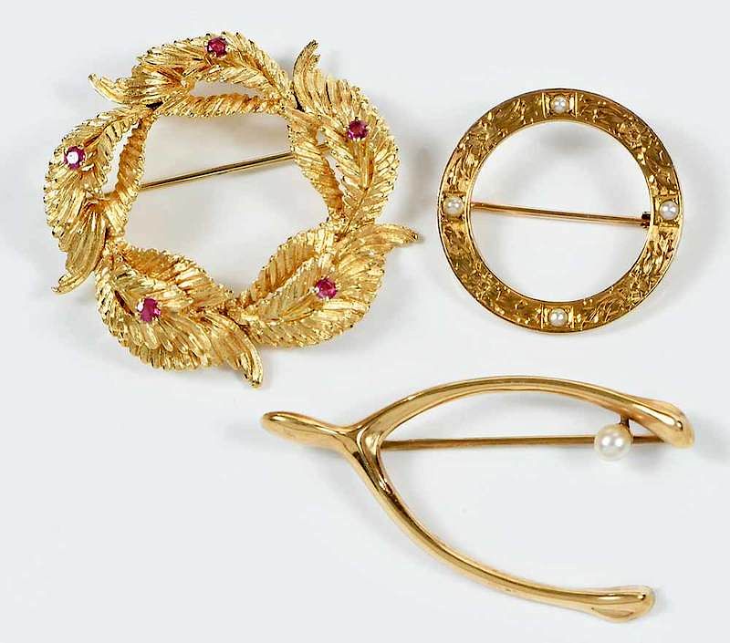 Appraisal: Three Vintage Gold Brooches wreath design five round faceted rubies