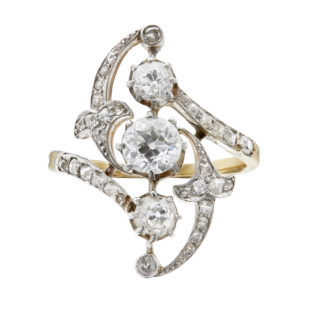 Appraisal: A Belle Epoque diamond set ring of pierced scrolling design