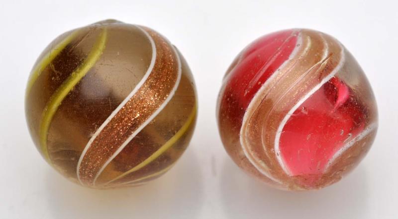 Appraisal: Lot of Two Lutz Marbles The smaller is a red