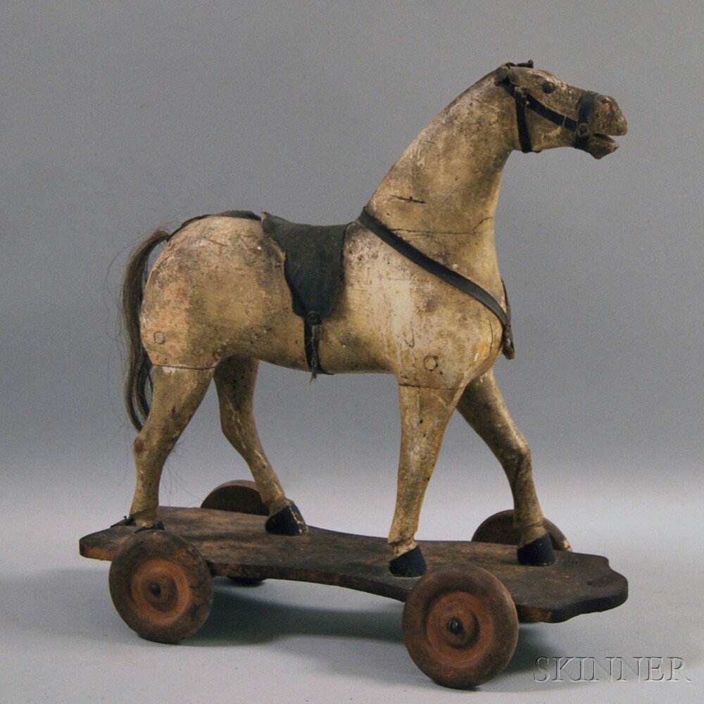 Appraisal: Carved and Painted Wooden Horse Pull-toy late th century with