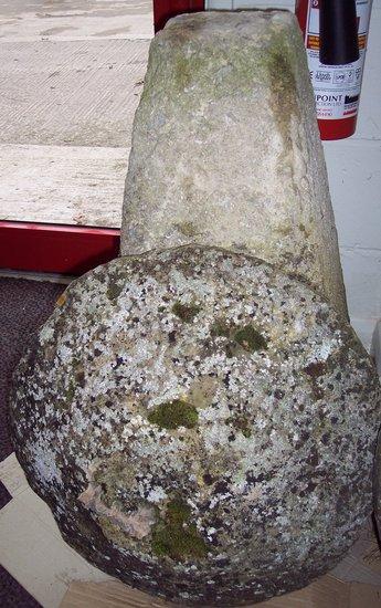 Appraisal: A staddle stone with top on a slender tapering base