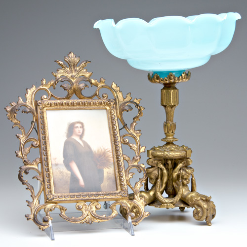 Appraisal: CONTINENTAL Centerpiece with ruffled blue glass bowl on bronze stand