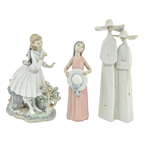 Appraisal: Two Lladro figures of young women and a group cm