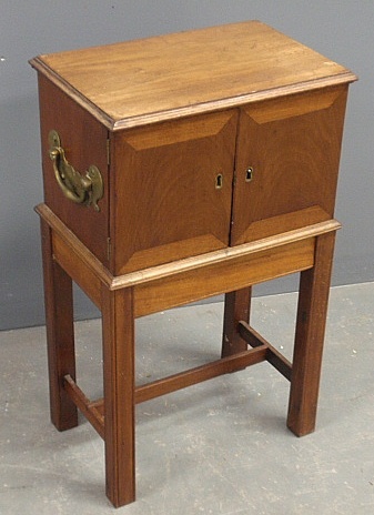 Appraisal: - Mahogany storage chest-on-stand early th c with brass pulls