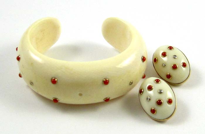 Appraisal: THREE ARTICLES OF IVORY AND CORAL JEWELRY including a pair