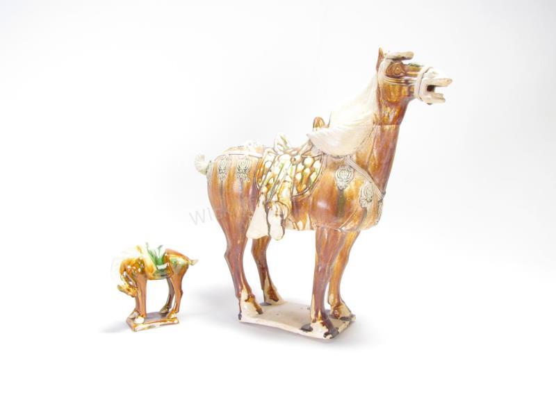 Appraisal: Two Reproduction Tang Pottery Horses one large horse with brown