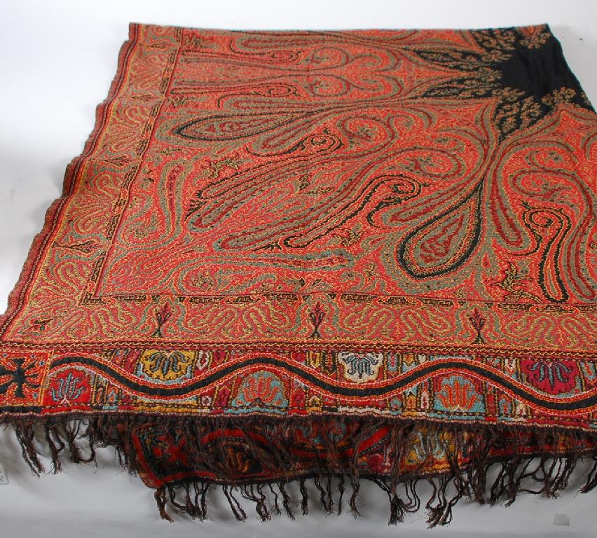 Appraisal: PAISLEY WOVEN FABRIC TABLE COVER with two fringed ends '