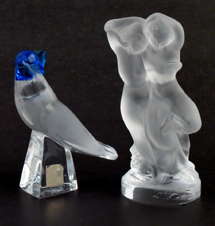 Appraisal: TWO LALIQUE CRYSTAL FIGURES a bird with blue top-knot on