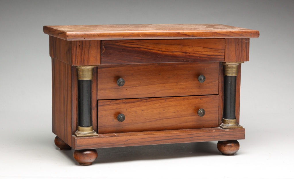 Appraisal: ITALIAN REGENCY STYLE MINIATURE CHEST Twentieth century rosewood and pine