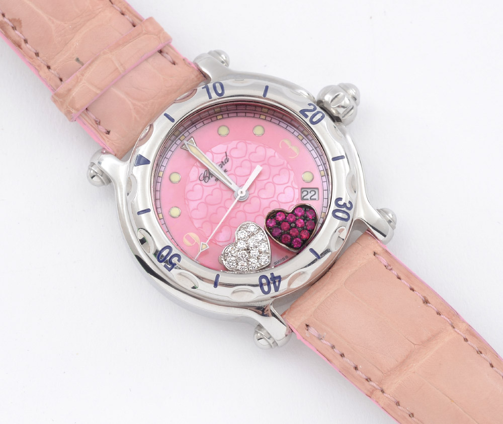 Appraisal: CHOPARD HAPPY SPORT LADIES WATCH Featuring floating ruby and diamond