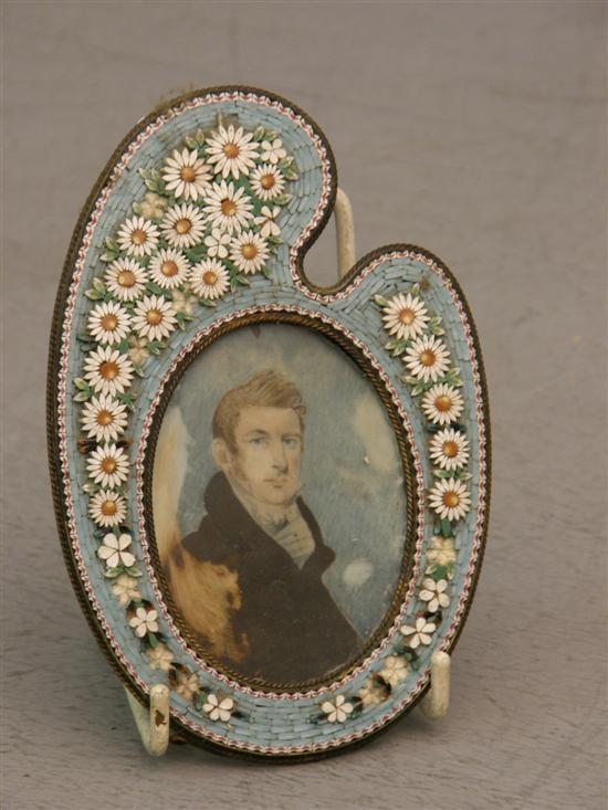 Appraisal: th century portrait miniature of a young gentleman in micro