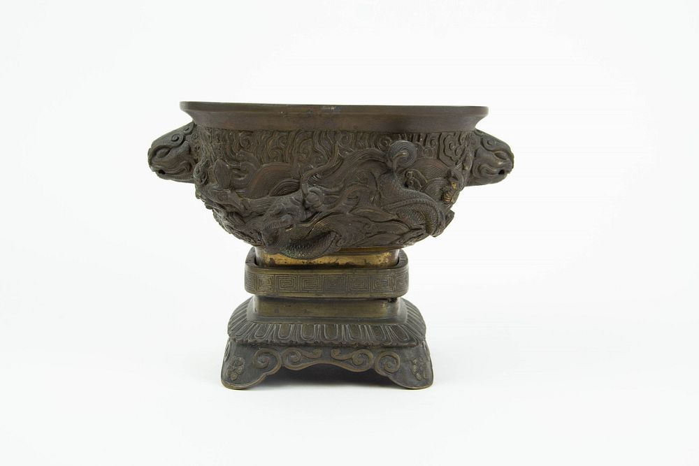 Appraisal: A Bronze 'Dragon' Censer with Stand Chinese likely Qing Dynasty