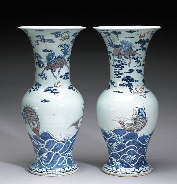 Appraisal: A pair of underglaze blue and copper red-decorated porcelain vases