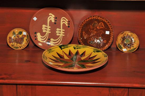 Appraisal: FIVE CONTEMPORARY REDWARE PLATES Includes a Breininger star decorated plate