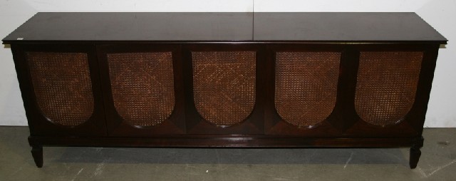 Appraisal: A mid th century low buffet with cane panel doors