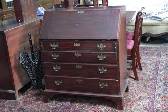 Appraisal: SLANT LID DESK Mahogany Chippendale style desk having a pigeon