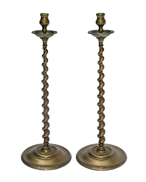 Appraisal: A pair of Victorian patinated brass candlesticks late th century