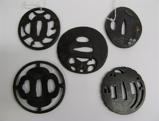 Appraisal: FIVE JAPANESE TSUBA SWORD GUARDS for daito and wakizashi of